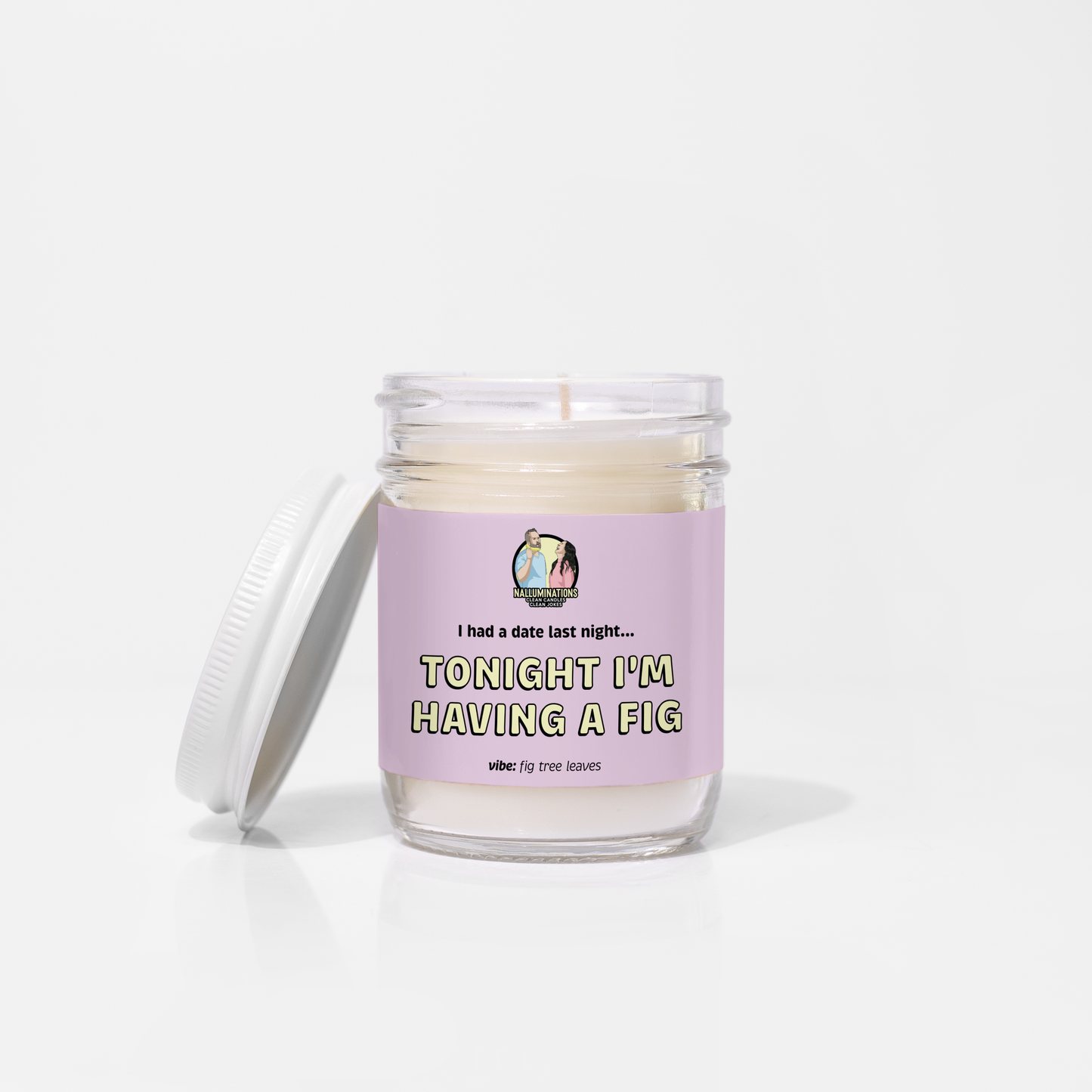 It’s a Fig Deal – fig scented funny coconut soy candle in 6.5oz clear glass jar with white lid and purple label, photographed on white background.