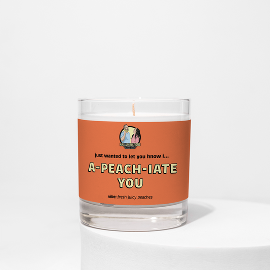 A-Peach-Iate You – peach scented funny coconut soy candle in 8oz clear glass jar with peach label, photographed on white background.