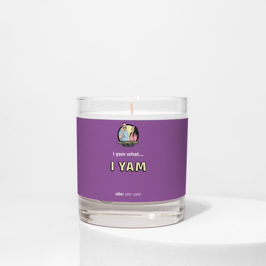 Coconut soy 8oz candle labeled “I Yam” in a bold purple design with ube cake scent, unlit on a white background.