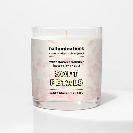 Nalluminations 8oz coconut soy candle in a clear glass vessel  with 'Soft Petals' description on a white background